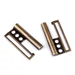 Arany színű fém kabátcsat / kapocs: 50 mm széles