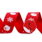 Karácsonyi ripsz szalag: Piros a. Télapós 24 mm széles