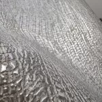 Metálos kollekció Speciel FX2: Hamuszürke-ezüst bőrtextúrás (mosható) vlies-vinyl tapéta