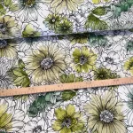 Rajzolt virágok zöldre festve dekortextil