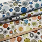 0,34 m EGYBEN KÉRHETŐ Világos alapon narancs-zöld-kék körök dekortextil (A)