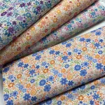 Kedves virágos: Fehér a. NARANCS-KÉK dekortextil (digitálisan nyomott)