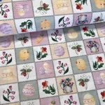 Négyzetekben húsvéti mintás dekortextil