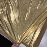 Kicsit gyűrött helyenként: Arany elasztikus fényes lamé (single foil jersey)