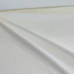 Ekrü egyszínű party vízlepergető szövet