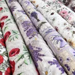 Bézses zsákvászon hatású alapon pipacsos party vízlepergető szövet