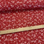 Piros alapon fehér pitypangos kékfestő jellegű pamutvászon