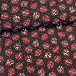 Fekete alapon népies katicás pamutvászon