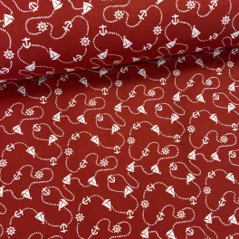 Piros alapon kishajós-kormánykerekes pamutvászon