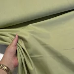 Hamvas zöld egyszínű pamutvászon (Sage green 15-0318)