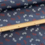 Sötétkék alapon biciklis pamutvászon