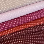 Piros alapon 2 mm-es kis pöttyös pamutvászon