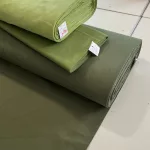 Sötétebb keki egyszínű pamutvászon (Dk. khaki 18-0523)