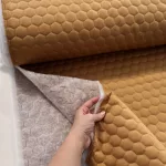 Steppelt vízlepergető (flízzel bélelt) anyag: Mustár/arany (#508)